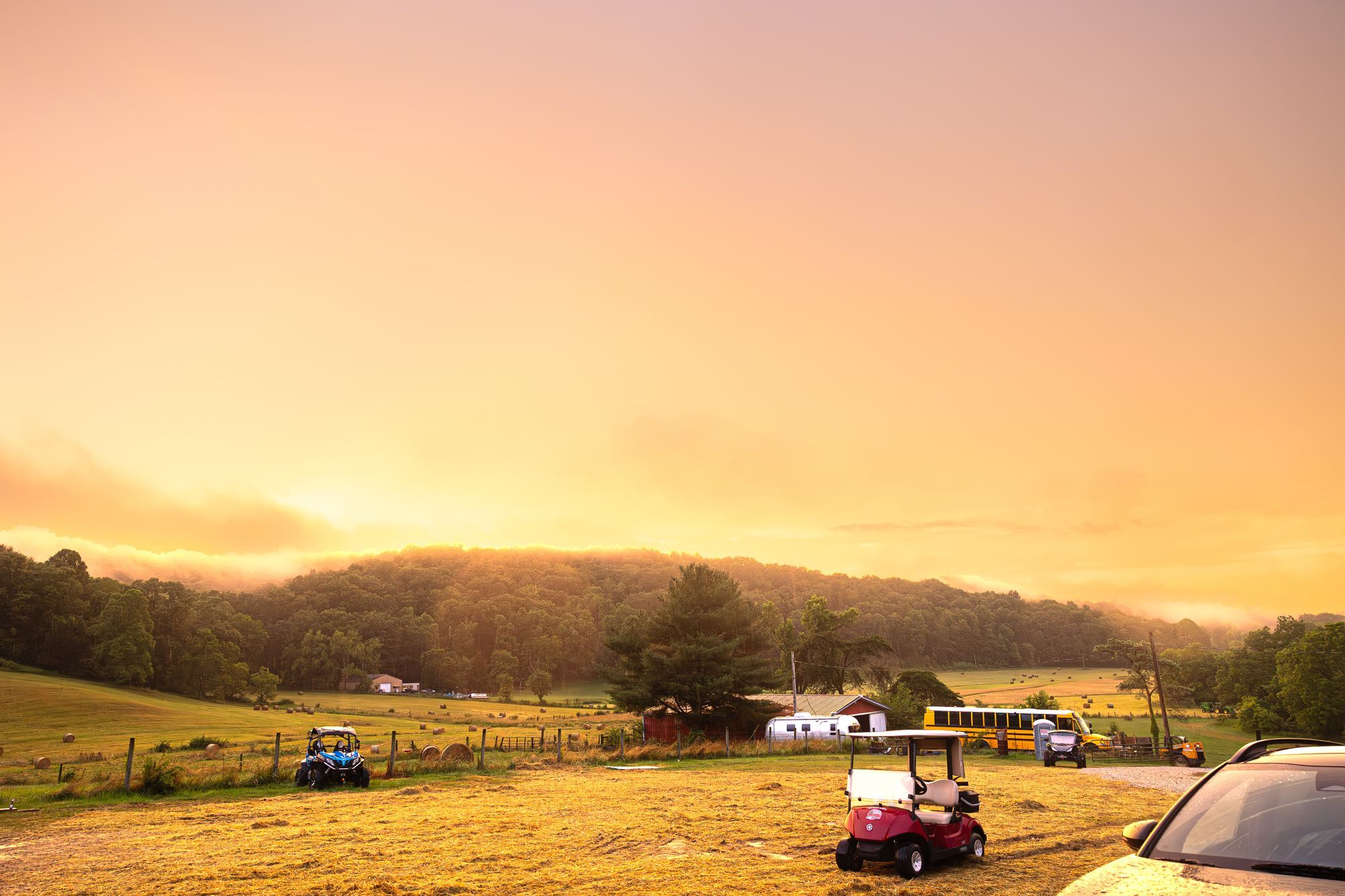 Golden-hour sunset over the pasture at Red Brick Ranch, Hocking Hills Ohio
