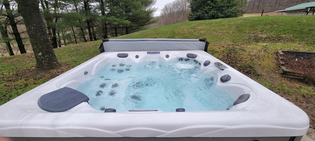 Hot tub on the deck of The Brick House at Red Brick Ranch, Hocking Hills Ohio